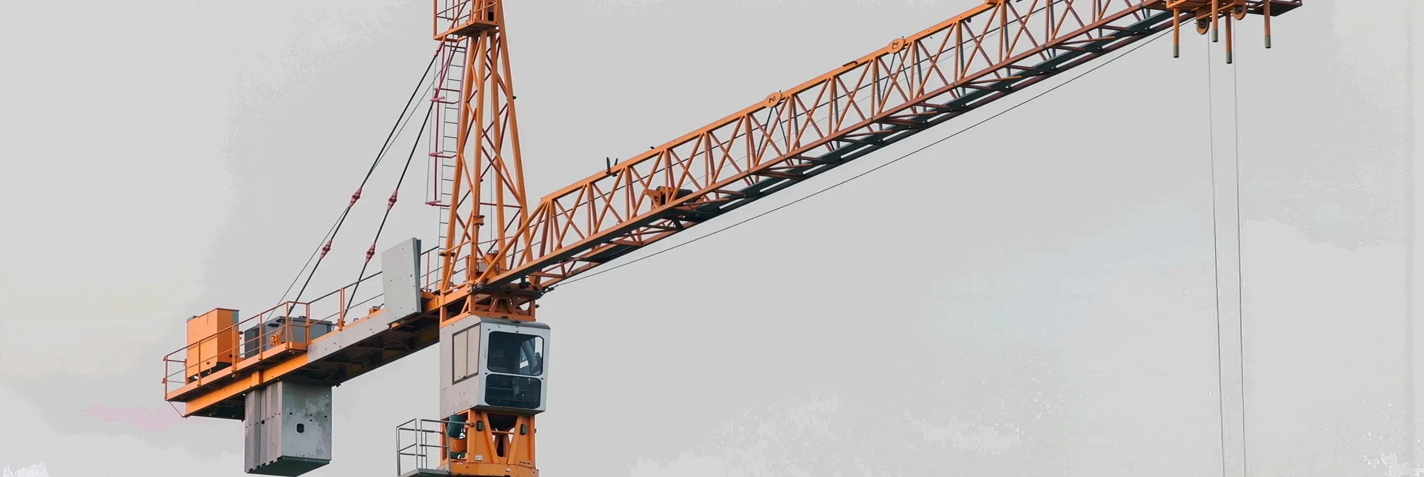 Tower crane against an overcast sky