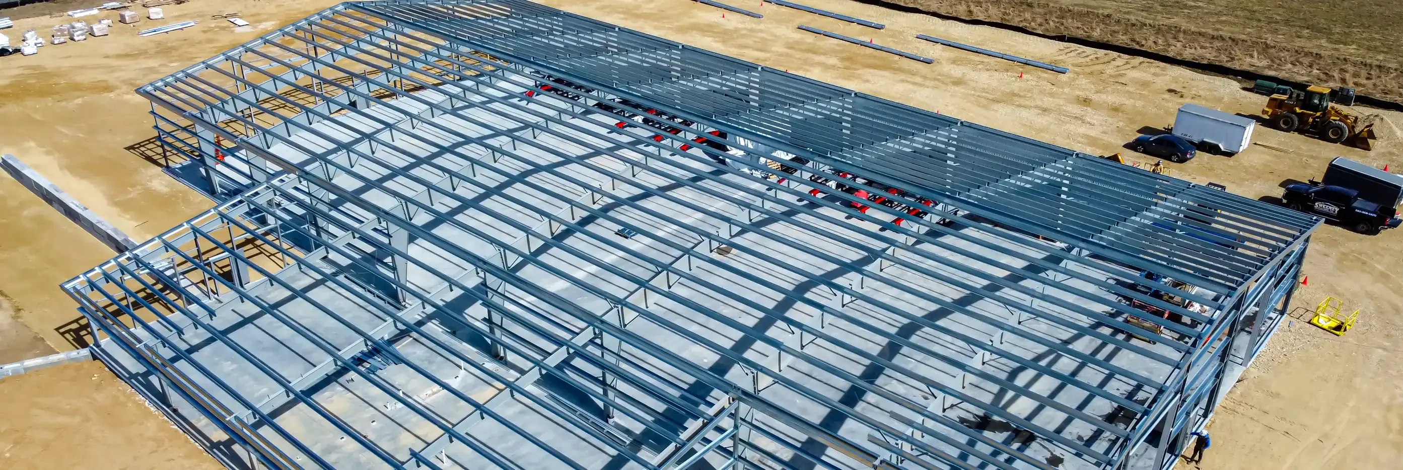 Steel frame of a building rising on a jobsite